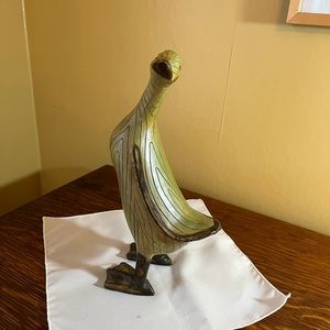 Wooden duck home decor. Green and brown in color. Lightweight.